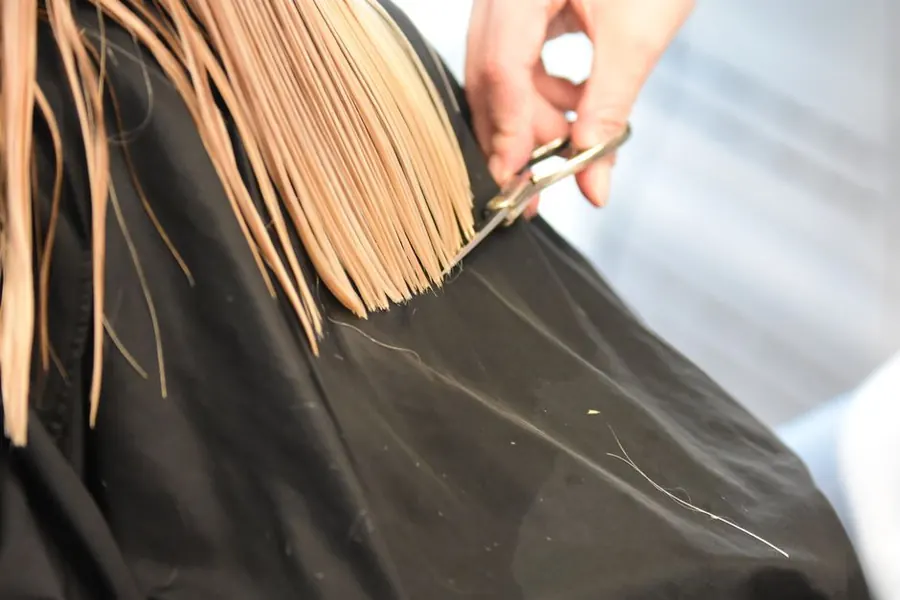 Close-up of a haircut in progress